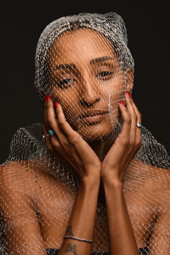 Pensive Veiled Portrait by Yoram GIL — canvas wall art