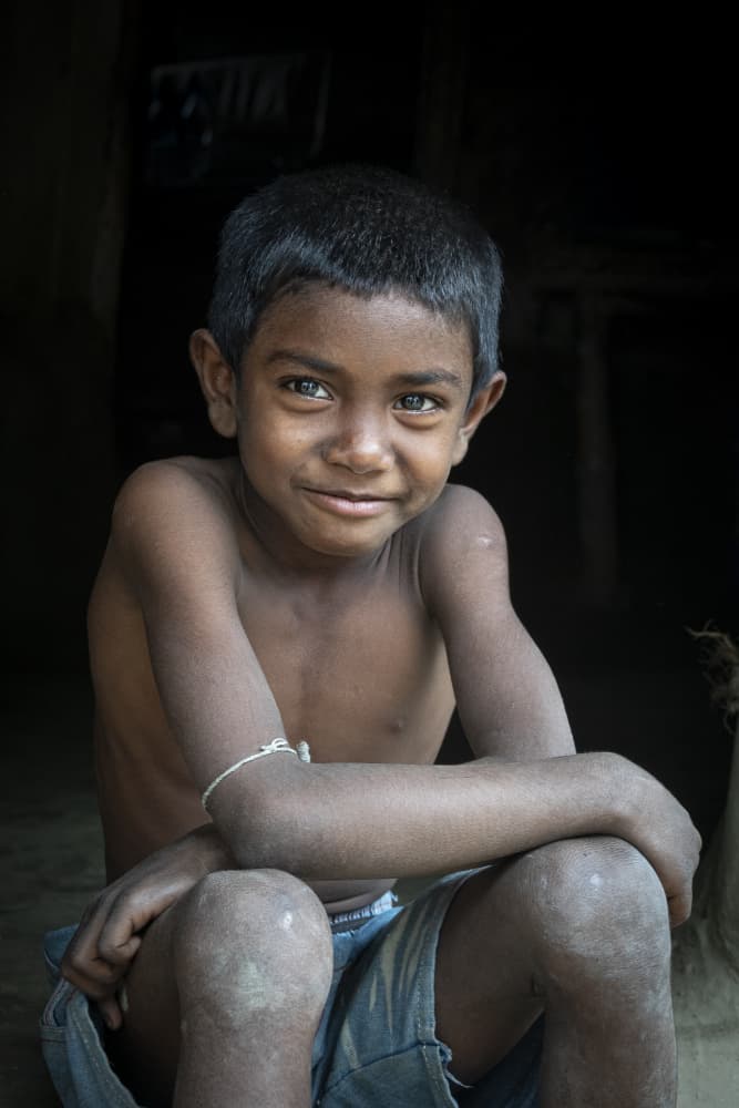 Smiling Young Boy by Elena Molina — canvas wall art