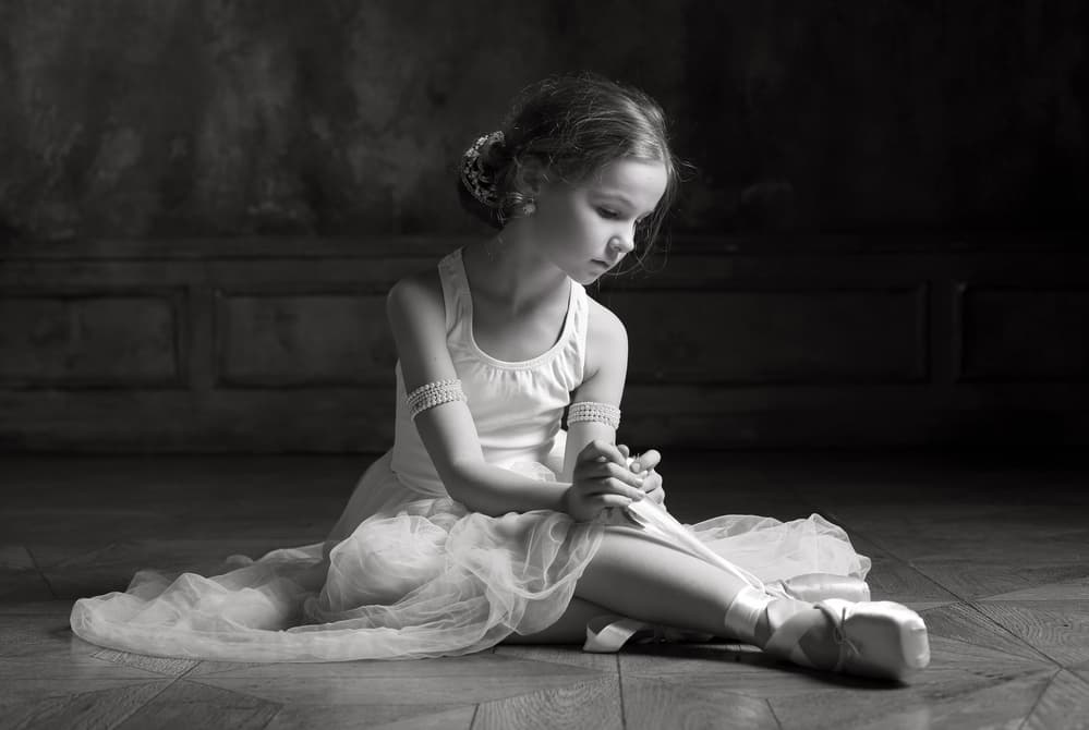 Young Ballerina's Quiet Moment by Victoria Glinka — canvas wall art