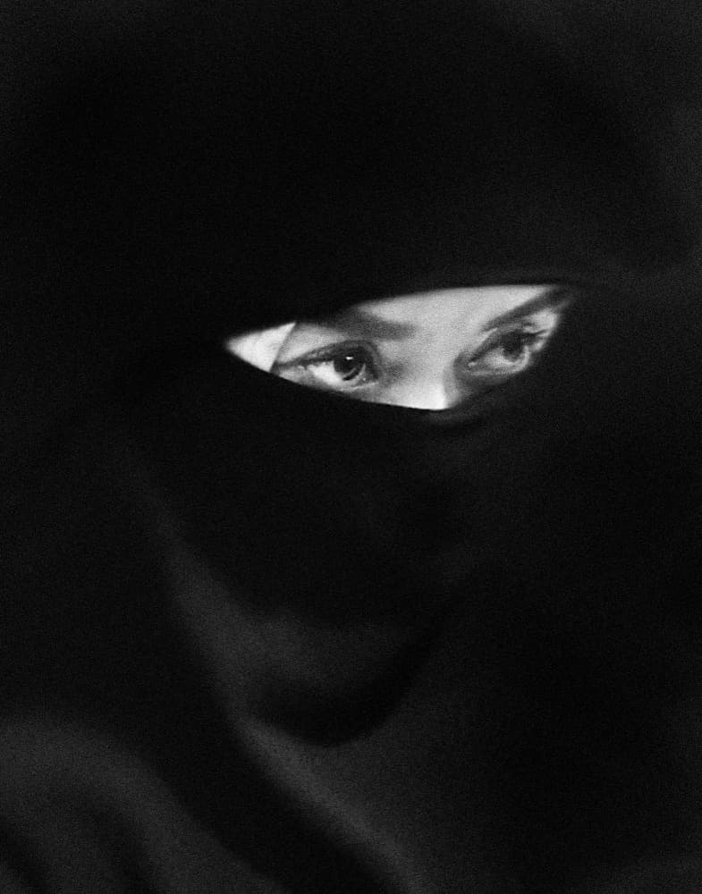 Woman's Veiled Gaze by Kahar Lagaa — canvas wall art