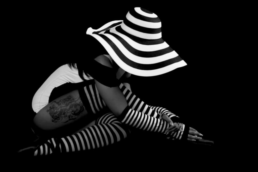 Striped Hat Elegance by Eyal Alcalay — canvas wall art