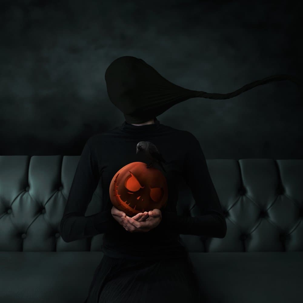 Mysterious Figure Holding Pumpkin by hardibudi — canvas wall art