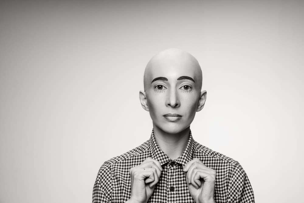Confident Bald Portrait by Photographer — canvas wall art