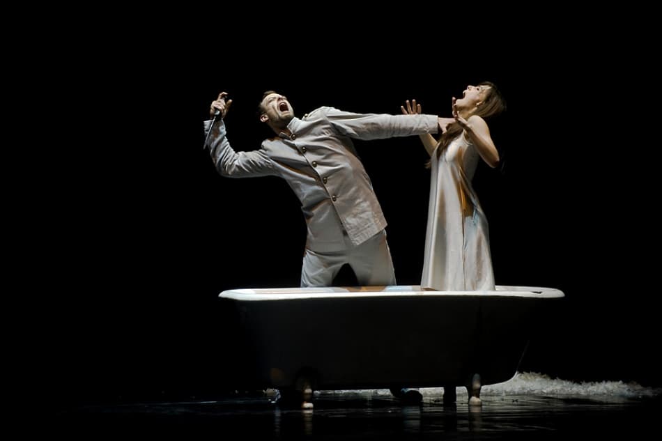 Couple's Bathtub Drama by Jure Kravanja — canvas wall art