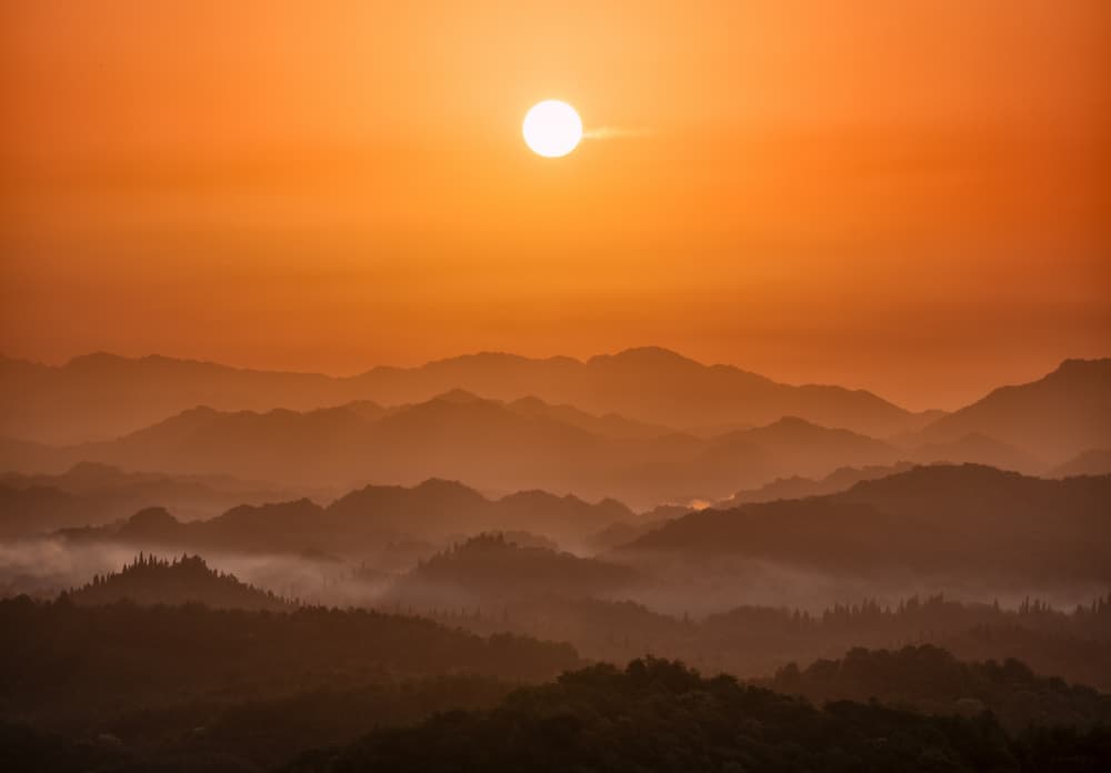 Misty Mountain Sunrise by Yezimao — canvas wall art