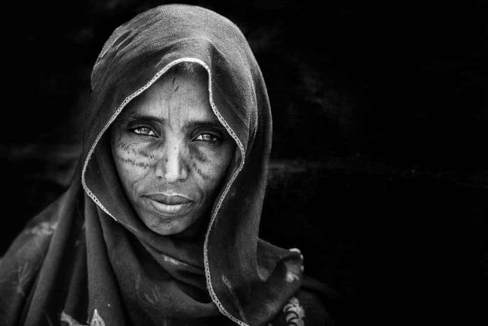 Woman's Deep Gaze by Trevor Cole — canvas wall art