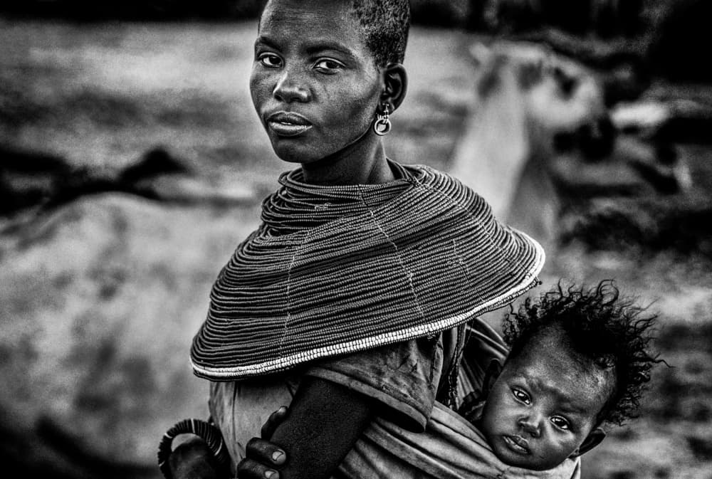 African Mother and Child by Joxe Inazio Kuesta Garmendia — canvas wall art