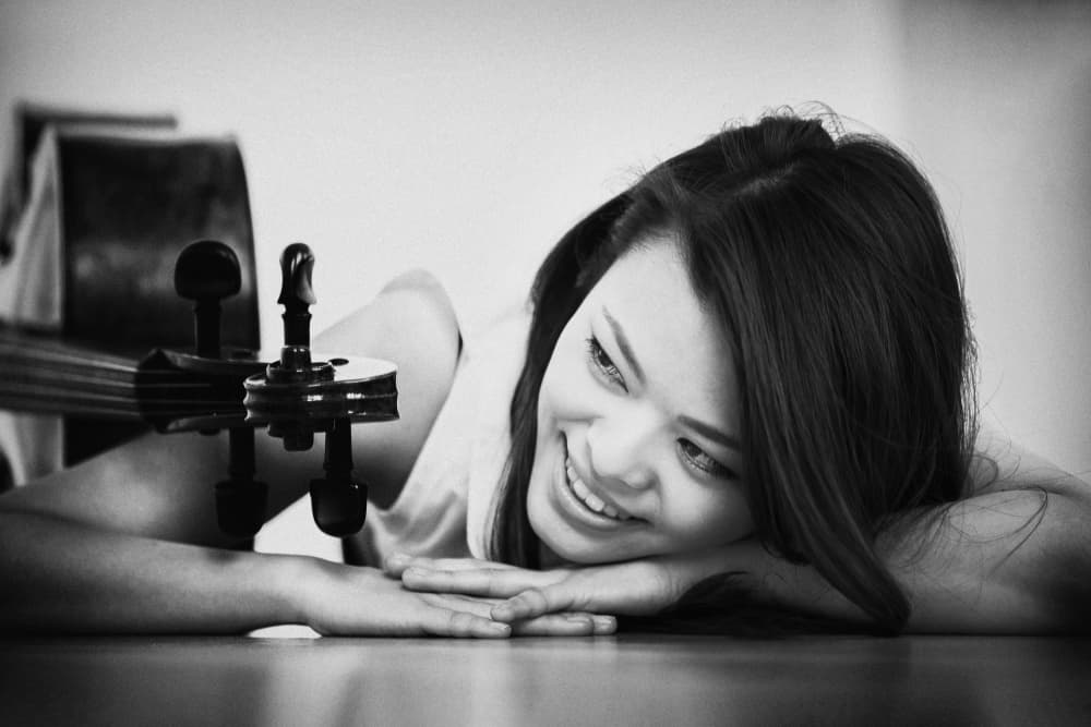 Smiling Musician with Cello by Eiji Yamamoto — canvas wall art