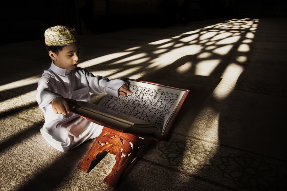 Muslim Boy Reading Quran by Saeed Dhahi — canvas wall art