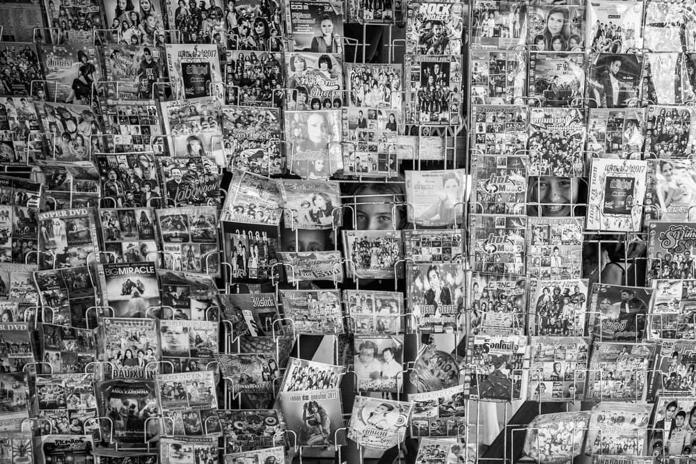 Market Stall Hidden Faces by Gloria Salgado Gispert — canvas wall art