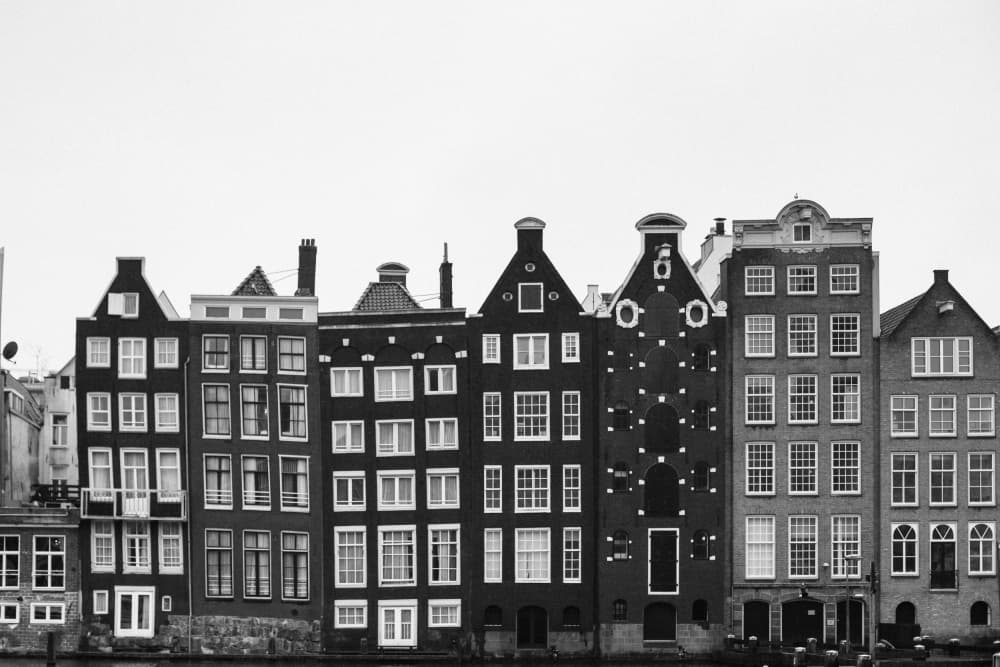Historic Amsterdam Canal Houses by Claudia Casal — canvas wall art