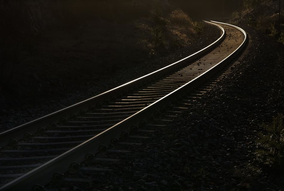 Curving Railroad Light by Allan Wallberg — canvas wall art