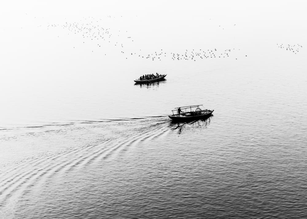 Serene River Boats by Gloria Staffa — canvas wall art