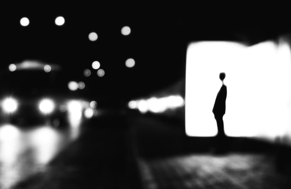Lone Figure Night City by Ali Ayer — canvas wall art