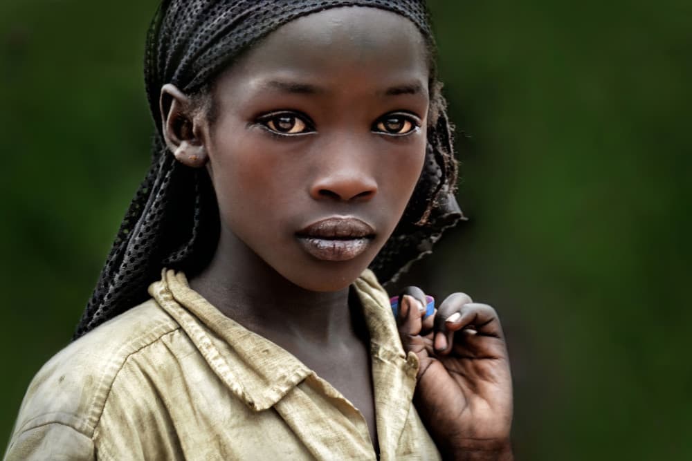 Pensive African Girl Portrait by Irene Perovich — canvas wall art