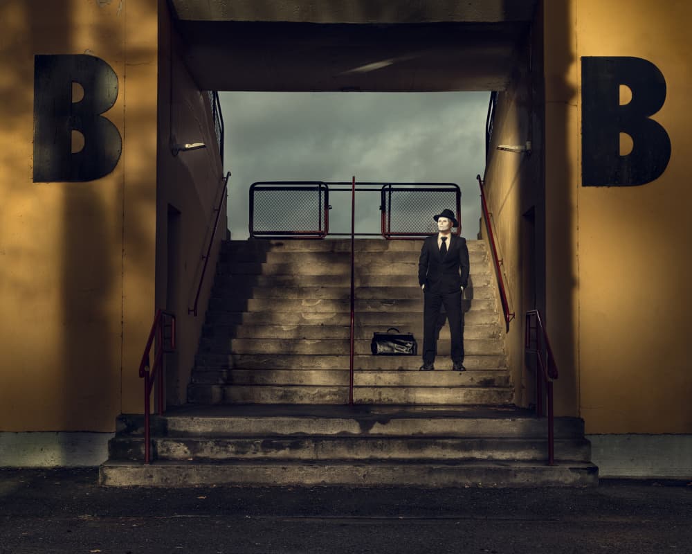 Masked Man on Stairs by Petri Damstén — canvas wall art
