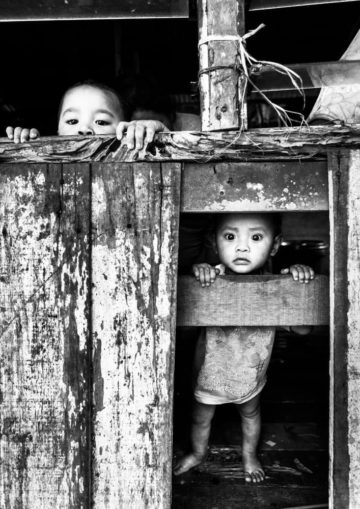 Curious Children Peeking by TORU MATSUNAGA — canvas wall art