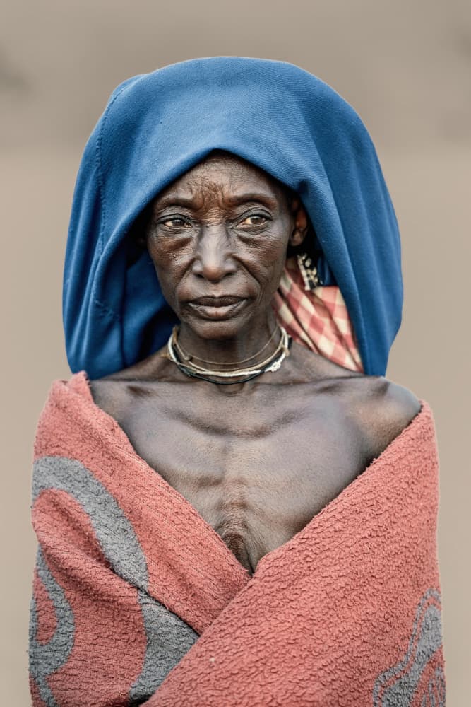 Woman in Blue Headscarf by Trevor Cole — canvas wall art