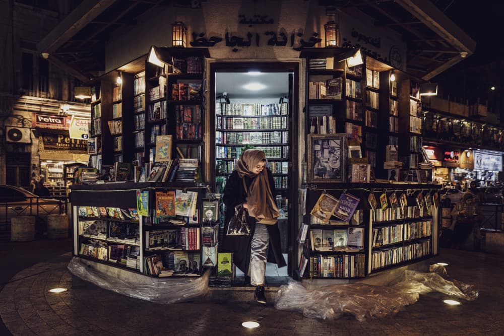 Woman At Night Bookstore by Marco Tagliarino — canvas wall art