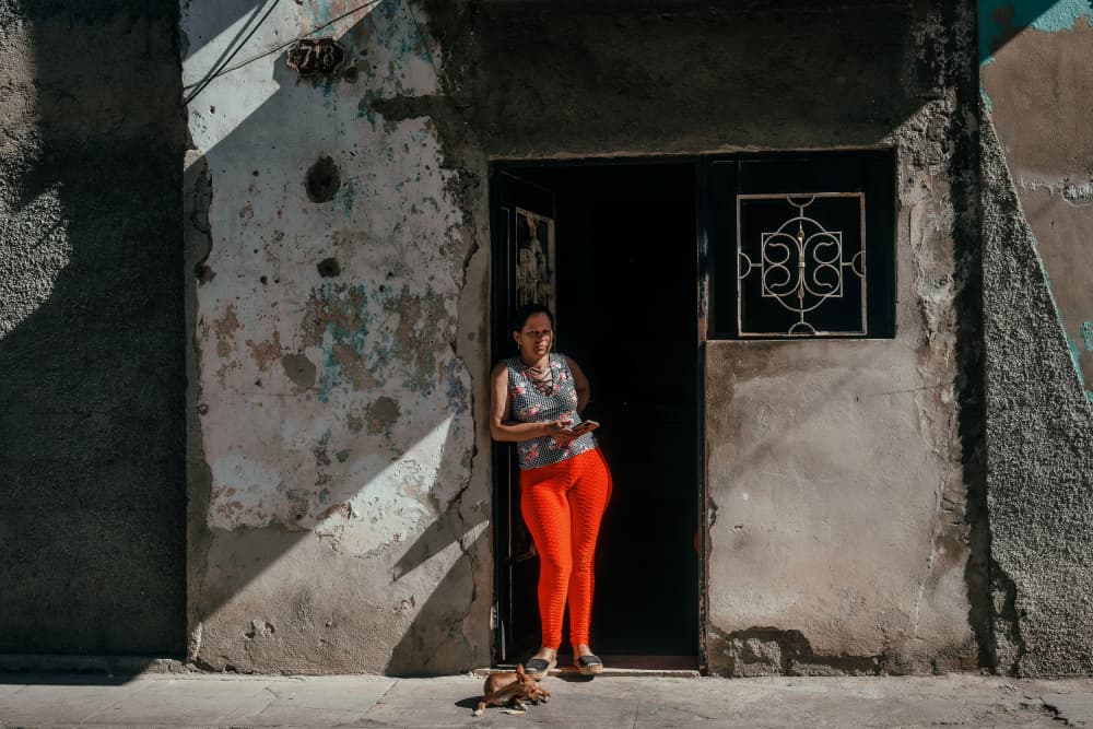 Woman In Urban Doorway by Andy Bauer — canvas wall art