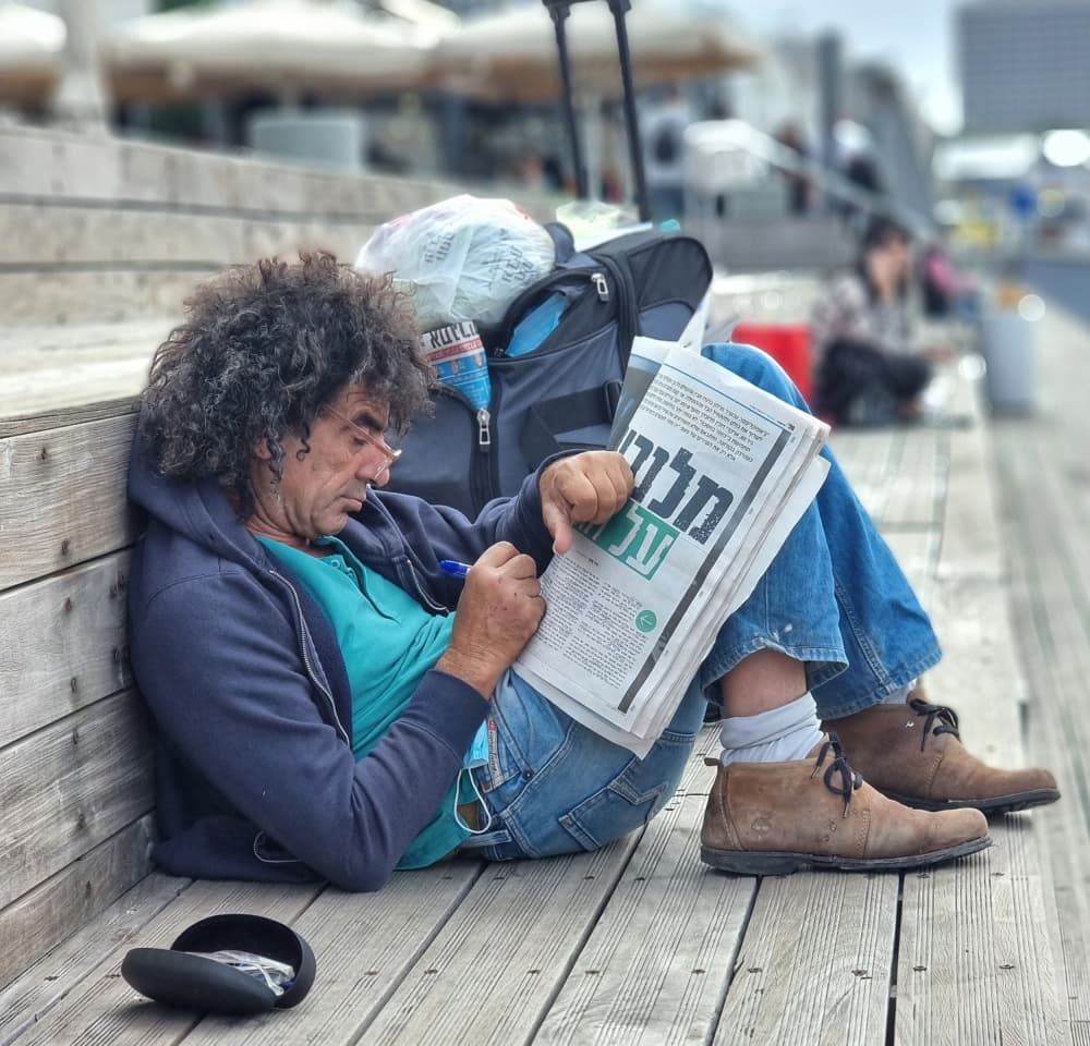 Urban Reader On Dock by Itzik Einhorn — canvas wall art