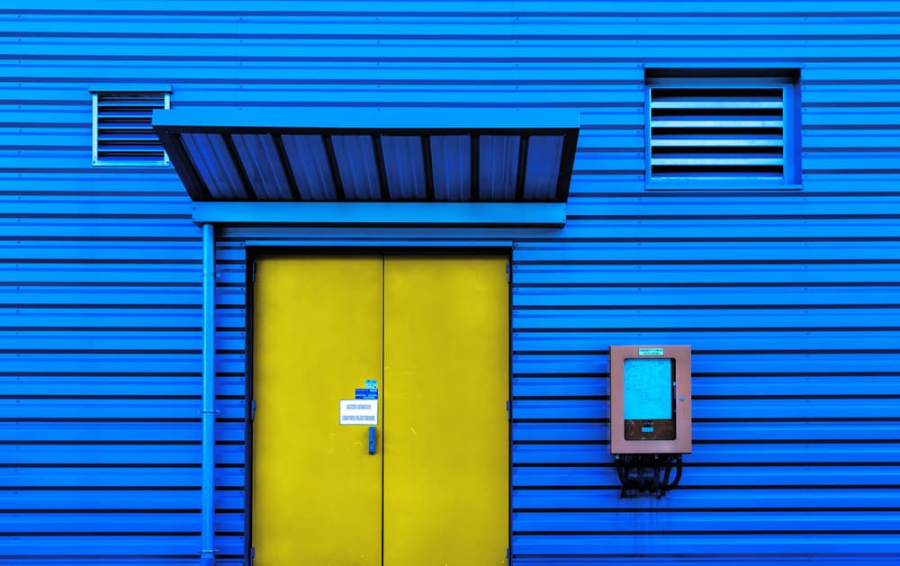 Blue Wall Yellow Door by Jois Domont ( J.L.G.) — canvas wall art