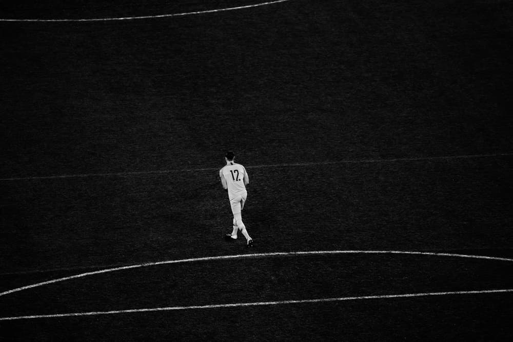 Solitary Player Field by Despird Zhang — canvas wall art