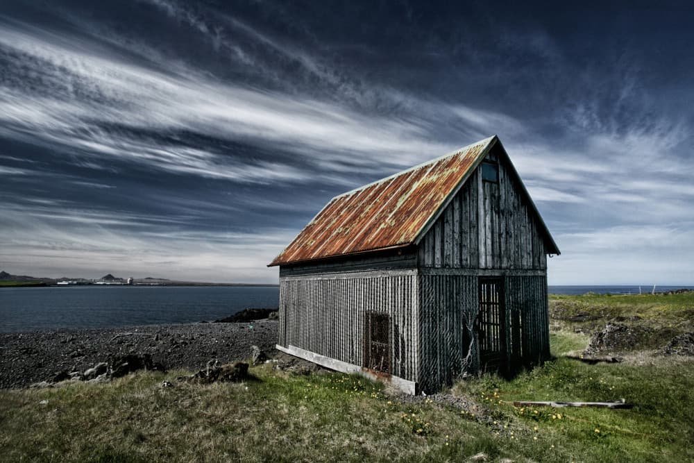 Rustic Ocean Shack by Þorsteinn H. Ingibergsson — canvas wall art