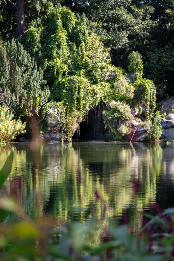 Lush Grotto Waterfall by Léa Lefebvre — canvas wall art