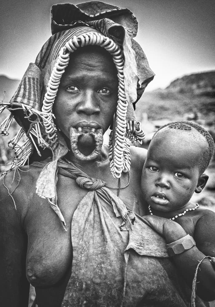Tribal Mother and Child by Joxe Inazio Kuesta Garmendia — canvas wall art
