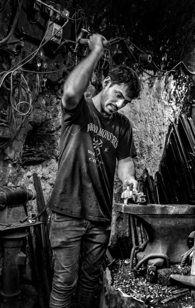 Artisan Forging Metal by Bashar Alsofey — canvas wall art