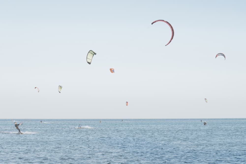Kitesurfing Blue Ocean by Lynann Colligan — canvas wall art