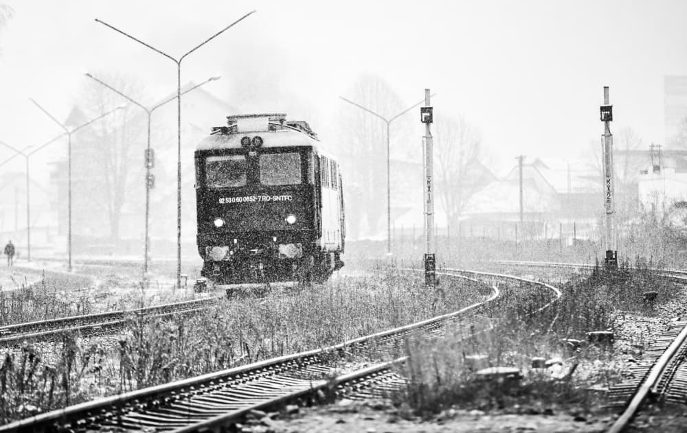 Train Through Falling Snow by Julien Oncete — canvas wall art