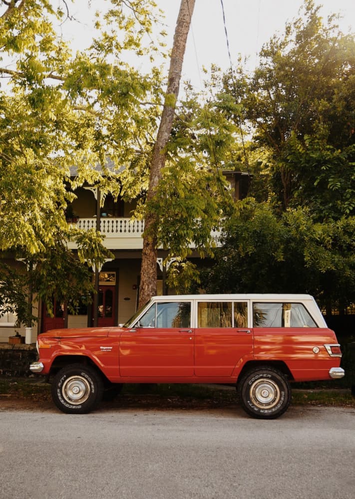 Classic Orange Jeep Wagoneer by Del Mundo Imagery — canvas wall art