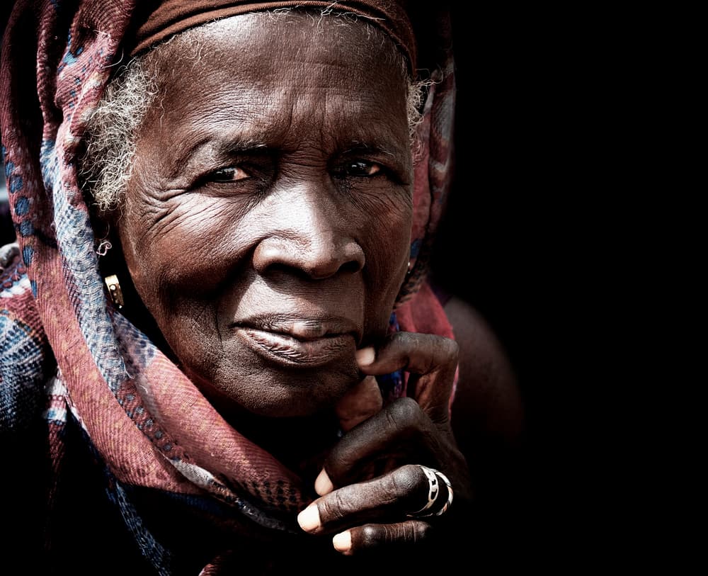 Thoughtful African Elder by Elena Molina — canvas wall art