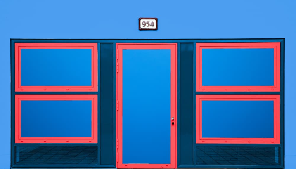 Vibrant Blue Facade by Roland M Schwerdtfeger — canvas wall art