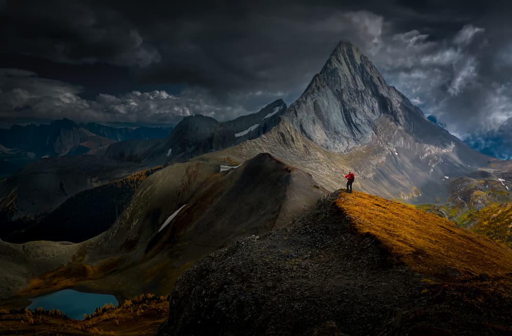 Lone Hiker Dramatic Peak by Bing Li — canvas wall art