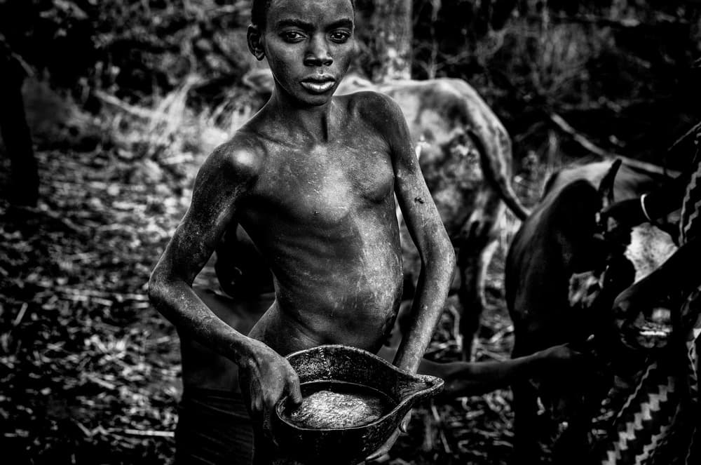 Village Boy's Gaze by Joxe Inazio Kuesta Garmendia — canvas wall art