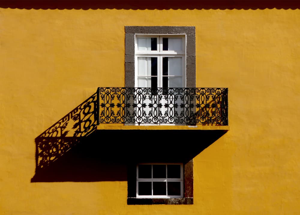 Yellow Wall Balcony Shadow by Hans-Wolfgang Hawerkamp — canvas wall art