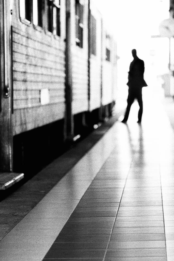 Solitary Man Waiting Train by Paulo Abrantes — canvas wall art