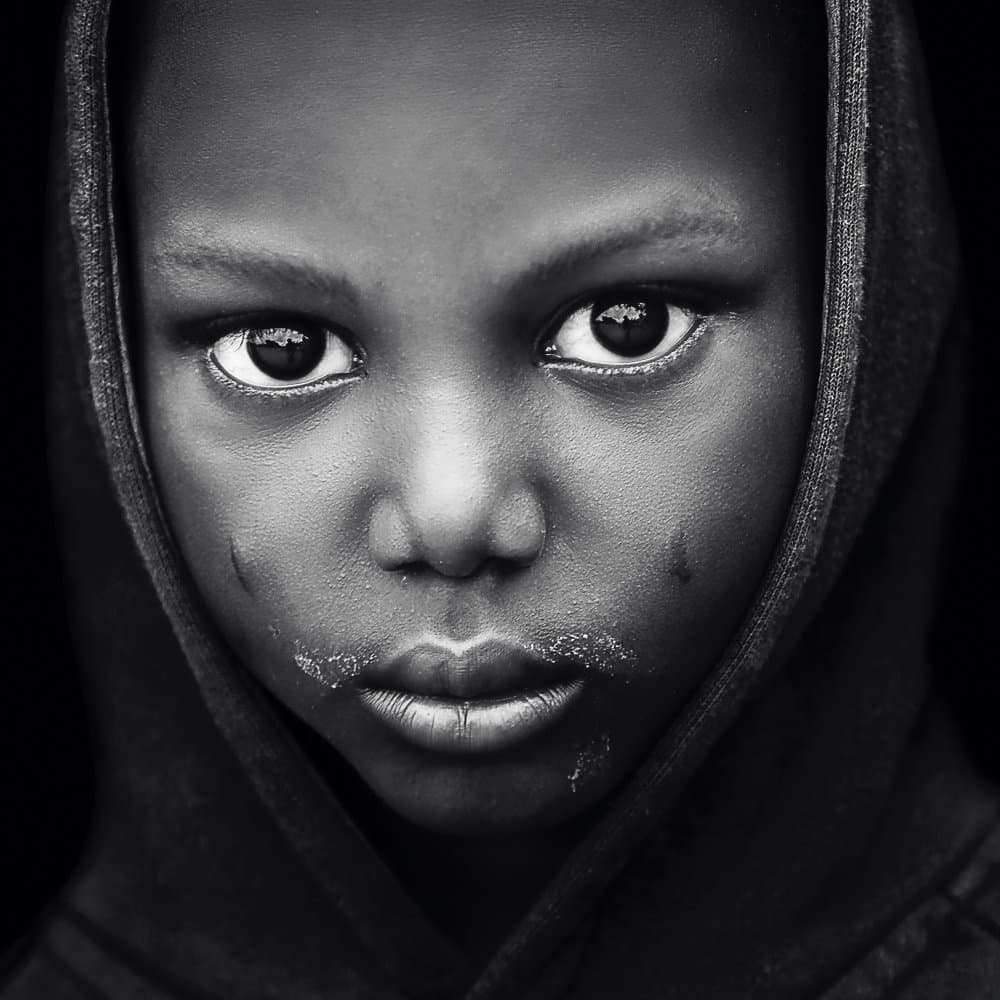 Intense Child Portrait by Emel Sefer — canvas wall art