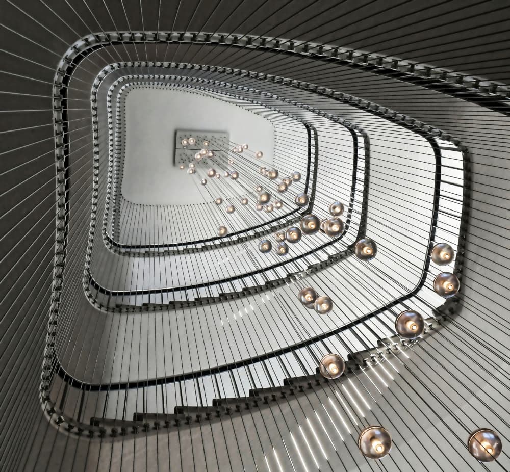 Elegant Spiral Staircase Lights by Renate Reichert — canvas wall art