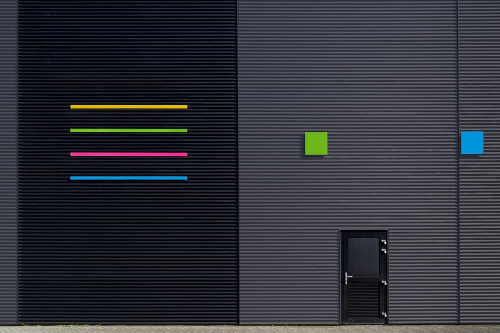Vibrant Geometric Facade by Theo Luycx — canvas wall art