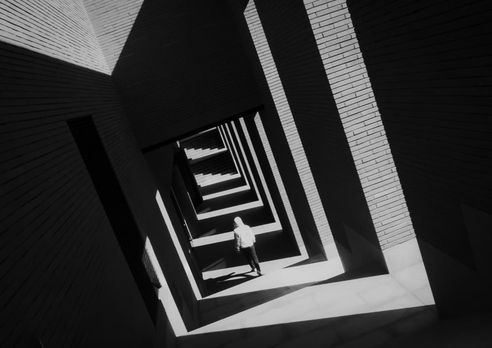 Solitary Figure in Shadows by Mi Young Choi — canvas wall art