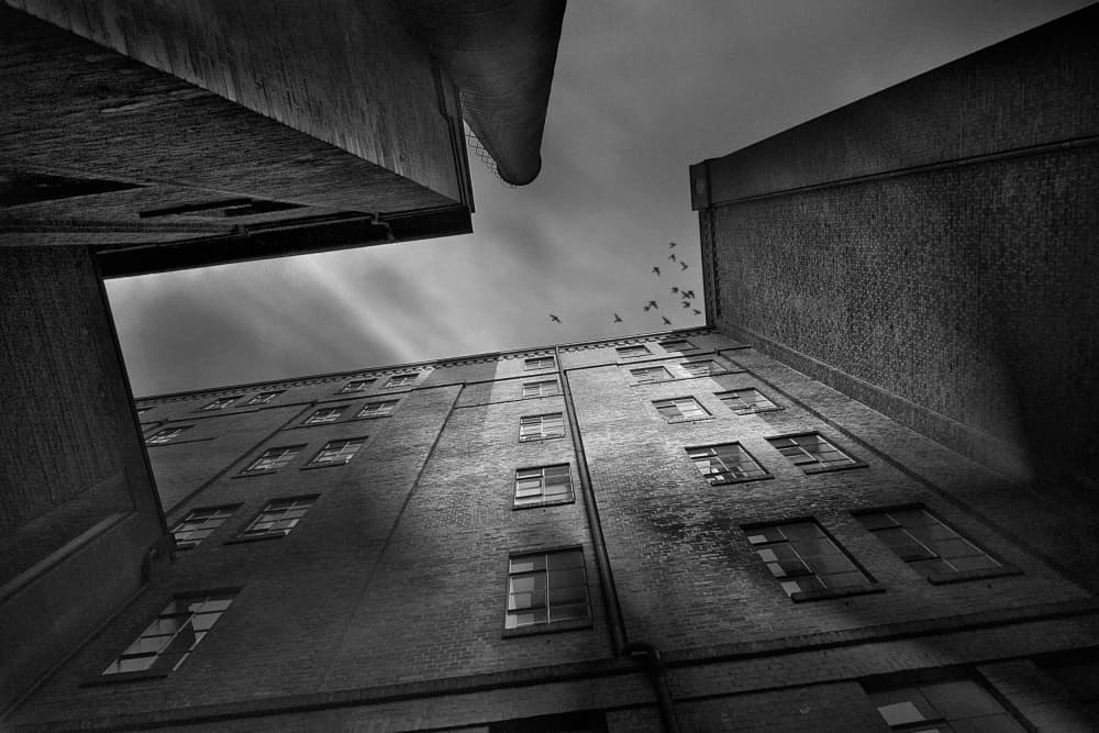 Towering Industrial Sky by Holger Droste — canvas wall art