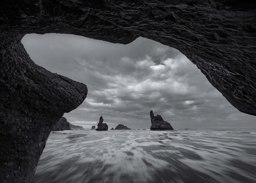 Dramatic Coastal Cave View by Jingshu Zhu — canvas wall art