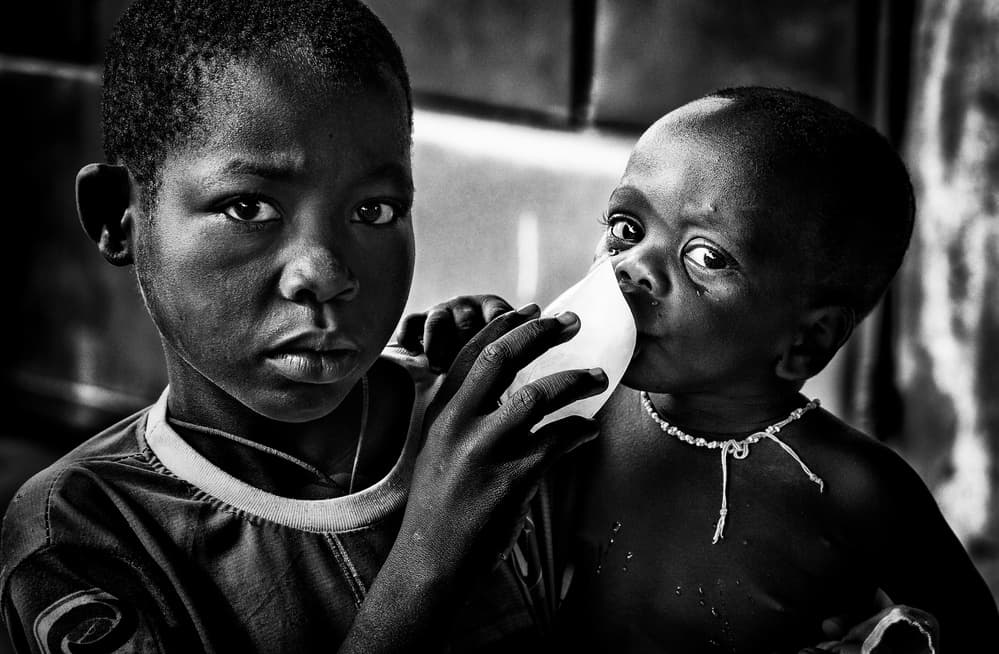 Young Boys Sharing Gaze by Joxe Inazio Kuesta Garmendia — canvas wall art