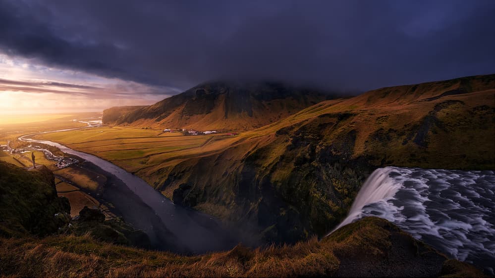 Dramatic Iceland Waterfall Sunset by Iván Ferrero — canvas wall art