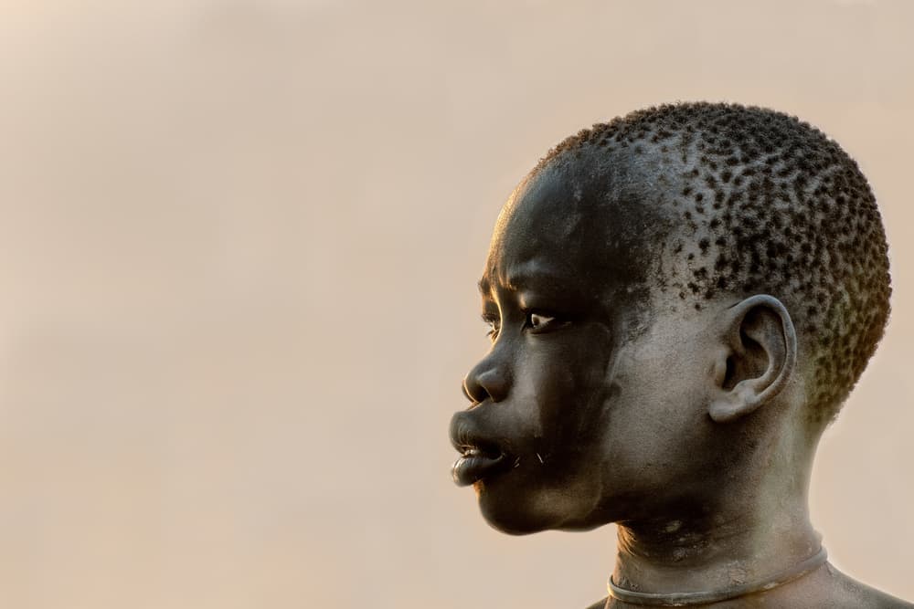 Contemplative African Boy by Trevor Cole — canvas wall art
