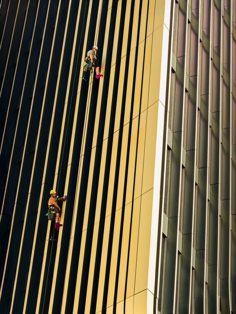 Golden Skyscraper Cleaners by Radek Pohnan — canvas wall art
